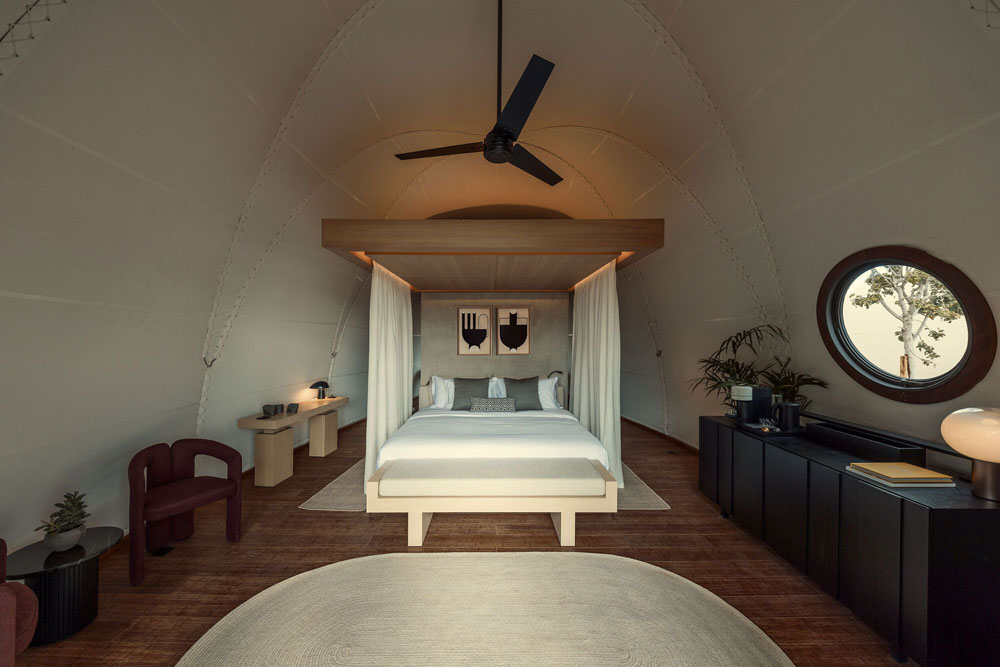 Secondary guest room at 91 Athens Riviera — distinct layout from primary bedroom, PressBeyond hotel image sequence