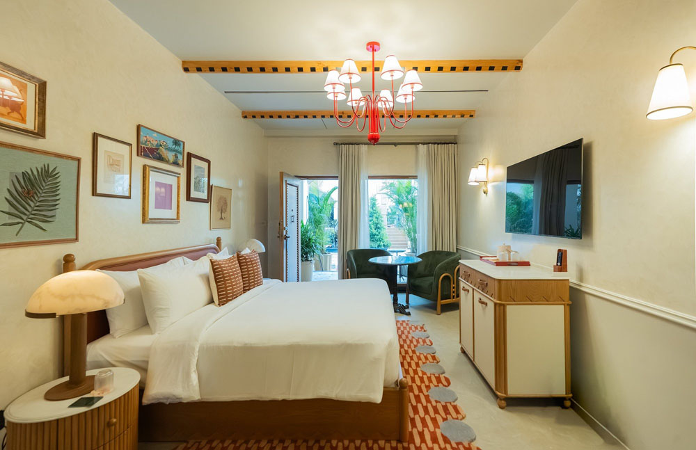 Secondary guest room at Hotel Irada — distinct layout from primary bedroom, PressBeyond hotel image sequence
