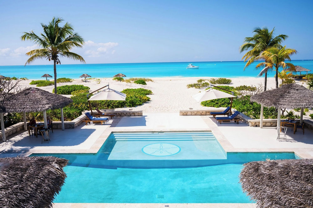 Lounge and social space at Pine Cay — distinct bar, dining, or terrace area, PressBeyond hotel series