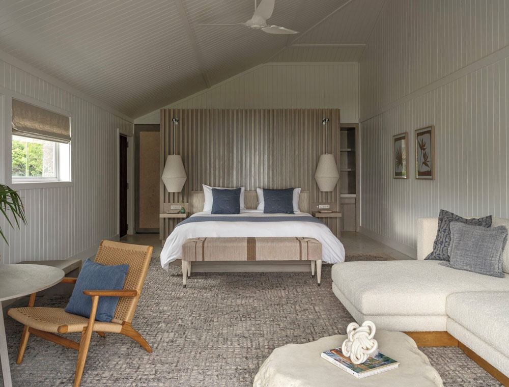 Secondary guest room at The Cove Eleuthera — distinct layout from primary bedroom, PressBeyond hotel image sequence