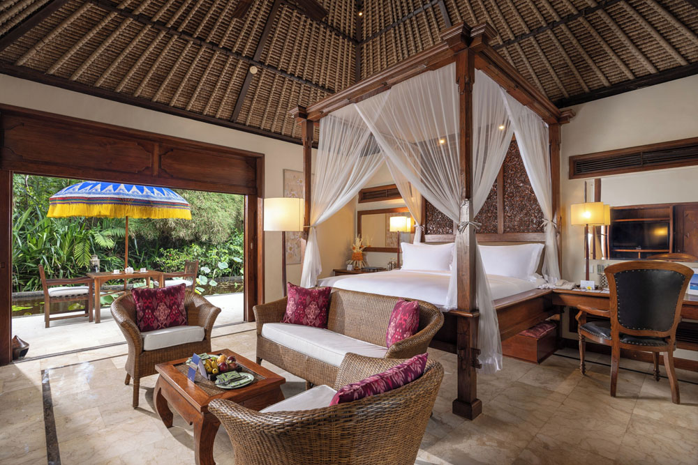 Secondary guest room at The Oberoi Beach Resort, Bali — distinct layout from primary bedroom, PressBeyond hotel image sequence