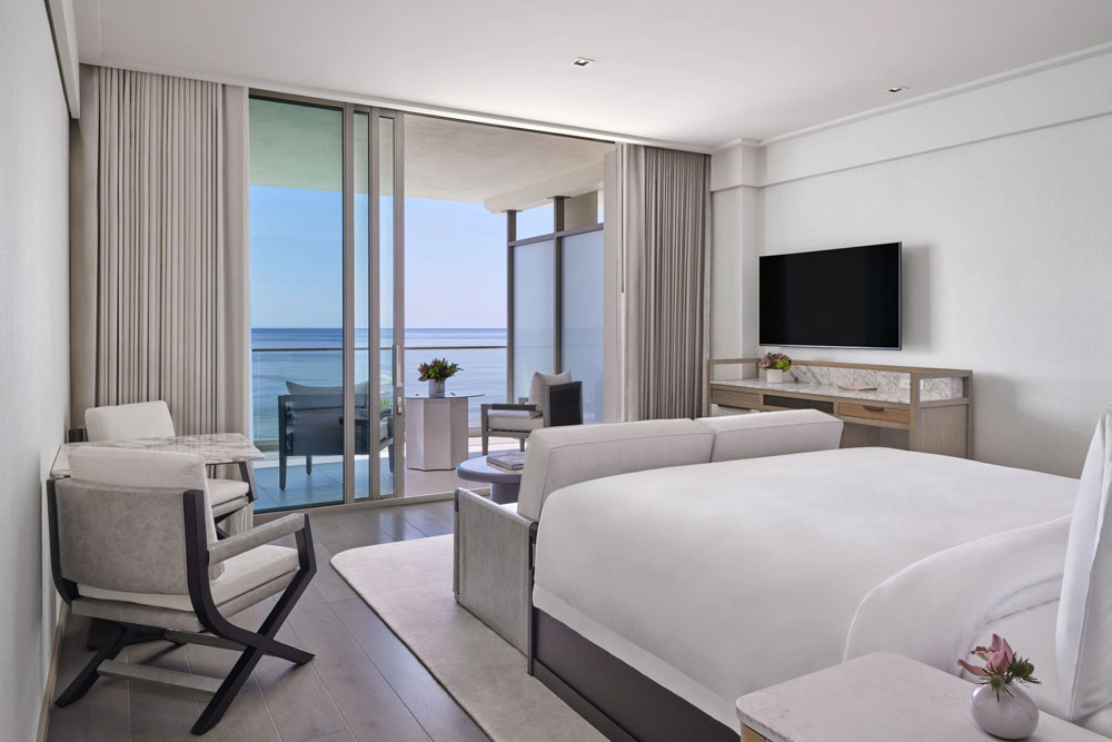 Primary guest room at The St. Regis Longboat Key — full-room view, natural lighting, clear sightlines, PressBeyond standard