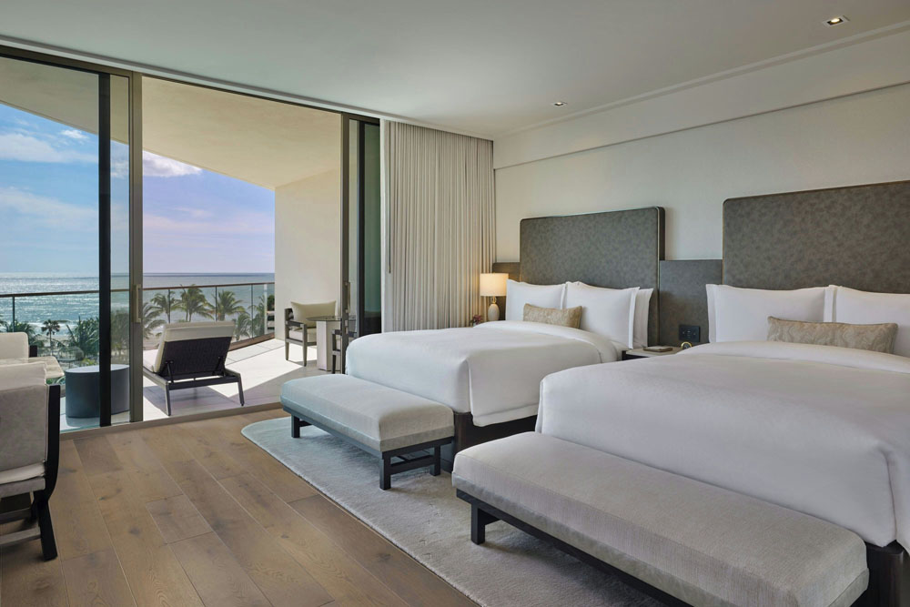 Secondary guest room at The St. Regis Longboat Key — distinct layout from primary bedroom, PressBeyond hotel image sequence